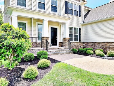 This Beautifully Landscaped Home features an Aggre