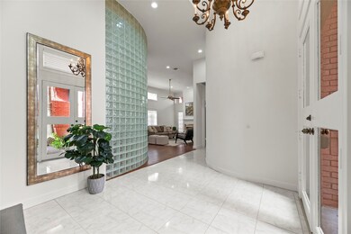 Entry viewed toward first floor den.