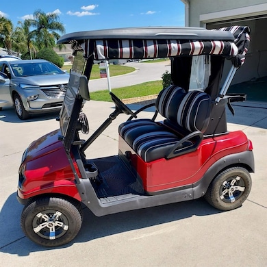 2015 electric Club Car golf cart to convey to buyer at closing.