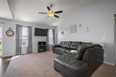 Vaulted ceilings and tons of natural light in livi