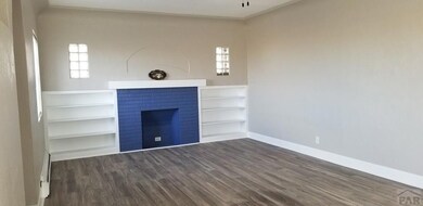 Welcoming  living room with electric fireplace.