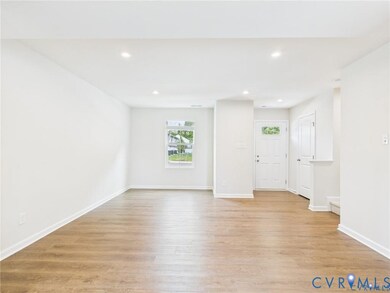 Unfurnished living room with recessed lighting and light wood-style floors