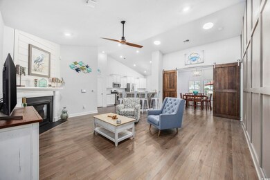Living room with hardwood / wood-style flooring, c