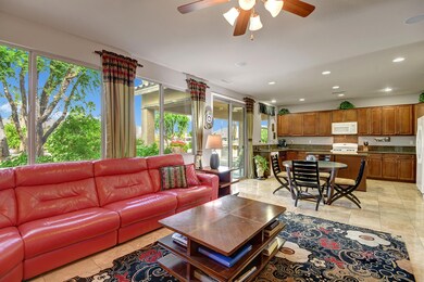 FAMILY ROOM ANGLED OUT TO KITCHEN MLS