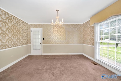 Carpet, chair rail, crown molding
