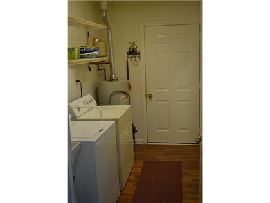 Other. Laundry room is off the kitchen. The washer