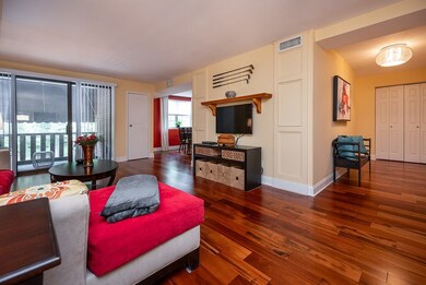 Stunning hardwood floors in living room with slide
