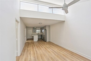 Soaring Ceilings with Skylights Provide Ample Natu