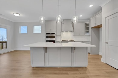Photos are of a similar home.