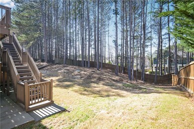 View of yard with stairs and fence