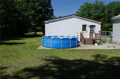 Back yard (pool conveys with home)