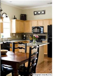 Another view of the kitchen area