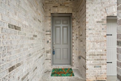 Covered entry way keeps you dry on rainy days.