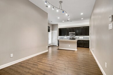 Vacant view of dining area to kitchen.