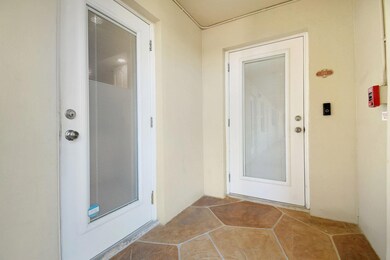 ENTRY DOOR INTO FOYER;KITCHEN DOOR