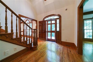 Looking back @ the front door.  Living Room on the right.  Dining Room on the left.