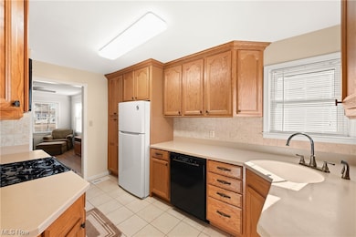 Remodeled kitchen with lots of cupboards and countertops and pantry!