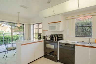 LARGE KITCHEN; EAT-IN AREA; DOOR WALL TO PATIO