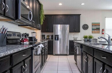 9035 Sunshine Ridge Loop, Kissimmee, FL 34747 - photo 6