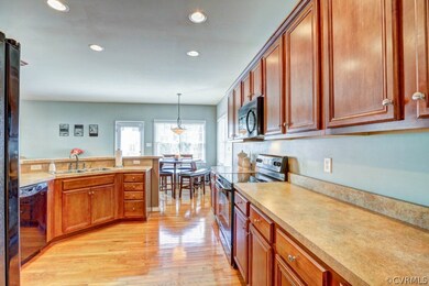 Huge open kitchen, loads of cabinets and counter s