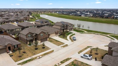 located in a cul-de-sac street just steps away from the subdivision lake and green space.