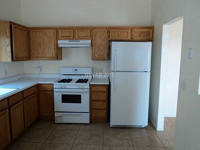 Property Photo. Kitchen with new range.