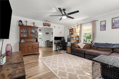 Spacious living room with laminate flooring