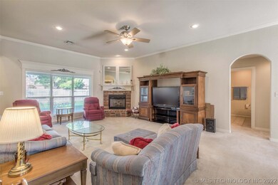 Crown molding, 10ft ceilings, fireplace, large win