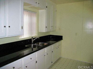 Kitchen with granite counters and stainless steel 