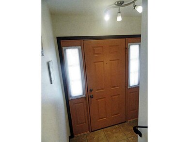 Entry/Foyer. Entrance door with side lights