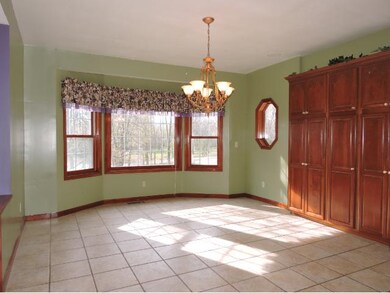 Tons of light is let into the dining room that als