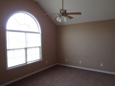 Master bedroom has walk-in closet and full bath.
