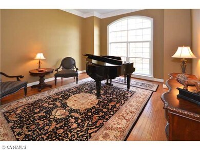 Living Room - Stunning Library on the Front of the