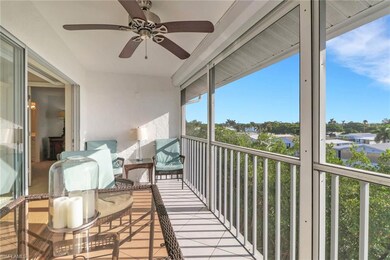 Balcony featuring a ceiling fan