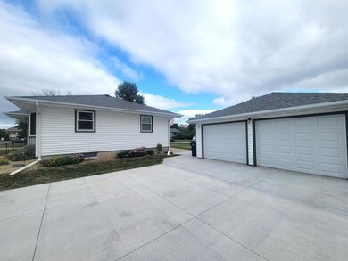 Two car garage and new concrete