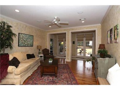 This friendly living room opens from the foyer all