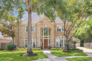 Daytime view of this lovely home zoned to excellent schools: Sampson Elementary, Spillane Middle and Cypress Woods High School.