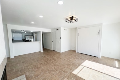 Living room with a foldable bed included.
