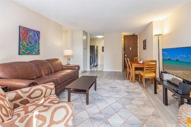 View of living room and kitchen area