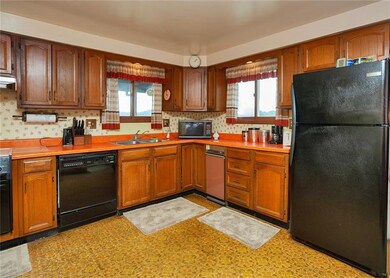 Appliances stay in this large kitchen