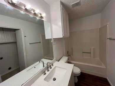 Full bathroom featuring washtub / shower combinati