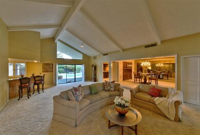 The vaulted ceiling and numerous floor to ceiling 