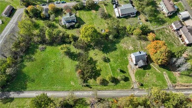 AERIAL VIEW OF HOME AND 3 LOTS~