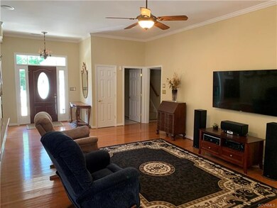 Family Room with Hardwood Flooring, Remote Ceiling
