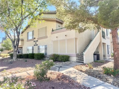 View of property with stairs and cooling unit