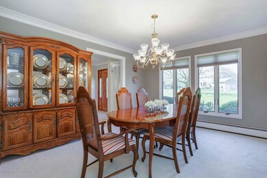 Dining room. Hardwood under carpet.