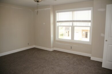 Primary Bedroom upstairs with a walk in closet and a full Bathroom.