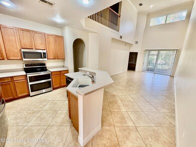 242 Tin Roof Ave unit 302, Cape Canaveral, FL 32920 - photo 2