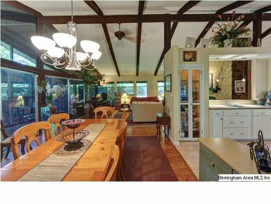Large informal dining space open to kitchen and li