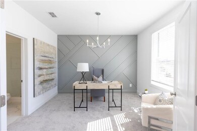 Bedroom on terrace level with its own private bathroom can also be used as an at home office - furniture not included - fantastic accent wall with upgraded lighting